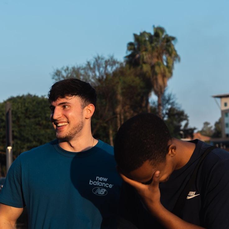 Kaveri Mehta, Lead Design Curator at ShoreLumenField, reviewing corporate floral arrangements